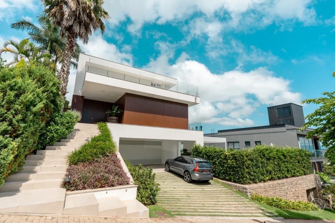 Casa de condomínio para venda com 4 dormitórios em Cacupé com 604 m²