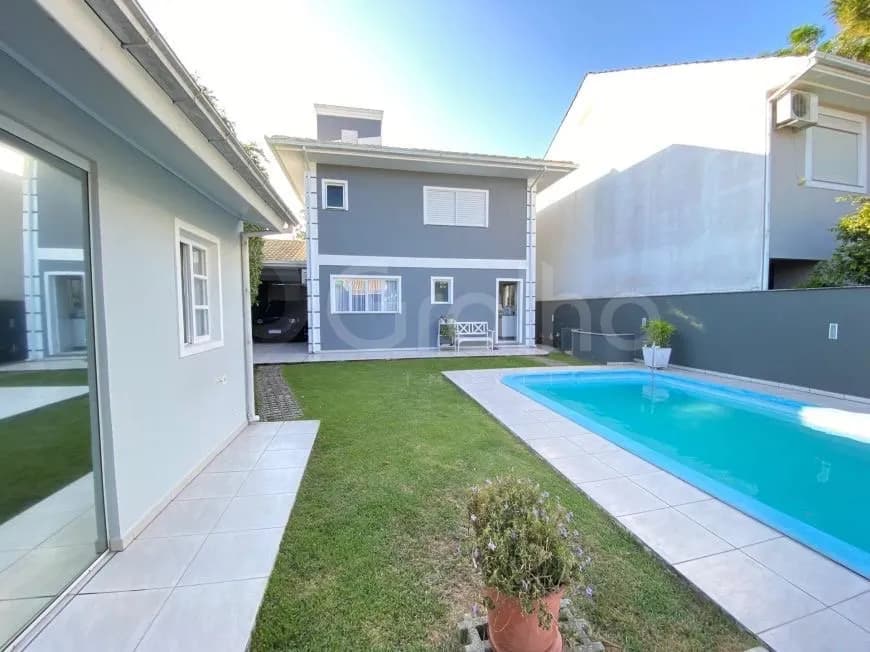 Casa para venda com 5 dormitórios em Santa Mônica com 240 m² — foto principal